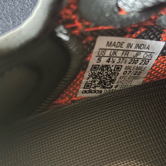 Yeezy Black and Orange Sneakers with Boost Cushioning - Picture 5 of 6